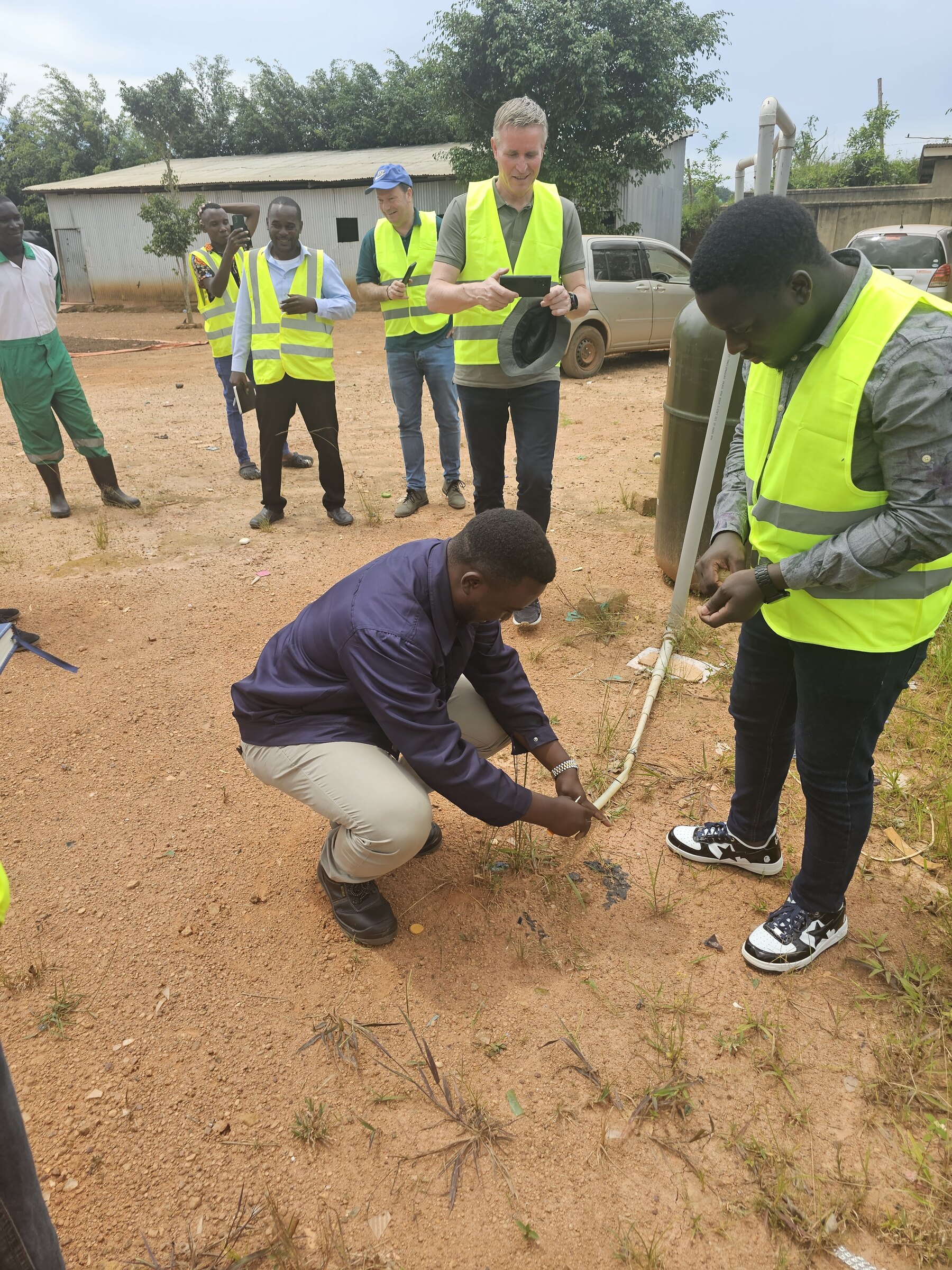 Mother cooking on Kyuka stove